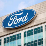FILE PHOTO: A Ford logo is seen on the Ford Motor World headquarters in Dearborn, Michigan